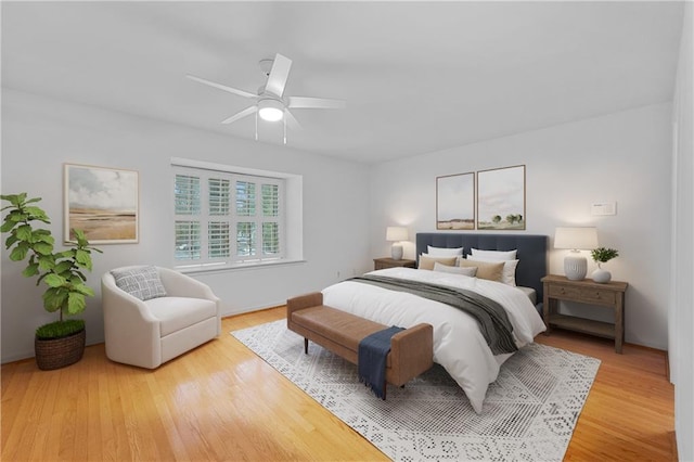 bedroom featuring light wood-type flooring and ceiling fan