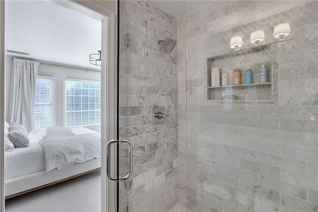 bathroom featuring an enclosed shower