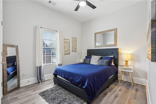 906 Sims St SW, Atlanta, GA 30603 - bedroom featuring visible vents, a ceiling fan, baseboards, and wood finished floors