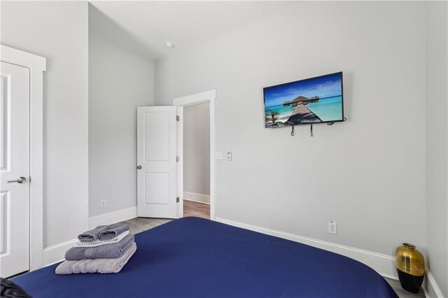 906 Sims St SW, Atlanta, GA 30603 - bedroom with baseboards and wood finished floors