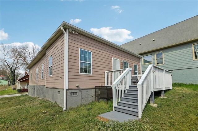 906 Sims St SW, Atlanta, GA 30603 - back of property featuring crawl space, a lawn, and a wooden deck