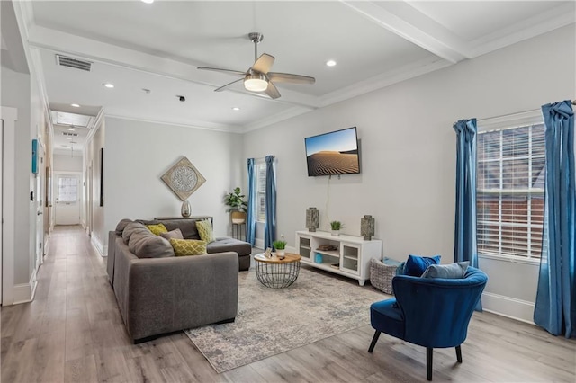 906 Sims St SW, Atlanta, GA 30603 - living area featuring beamed ceiling, plenty of natural light, visible vents, and wood finished floors