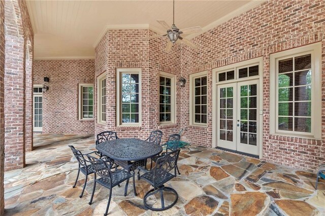 view of patio with a ceiling fan, french doors, and outdoor dining area