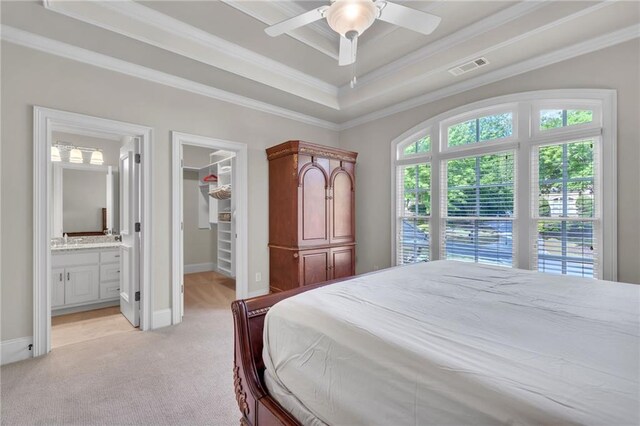 bedroom with high vaulted ceiling, visible vents, baseboards, carpet, and two closets