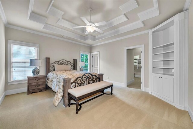 bedroom featuring light carpet, a tray ceiling, ornamental molding, and visible vents