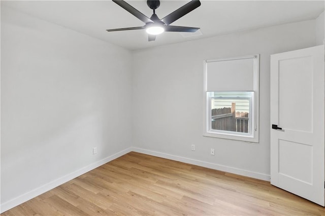 unfurnished room featuring ceiling fan and light wood-type flooring