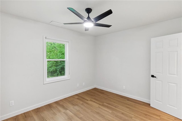 unfurnished room featuring ceiling fan and light wood-type flooring