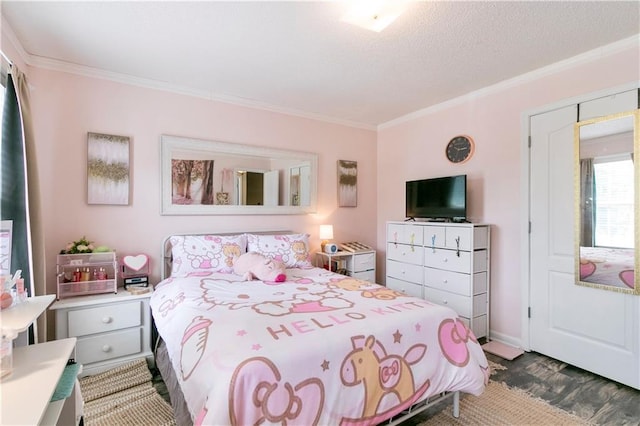 bedroom featuring a textured ceiling and ornamental molding