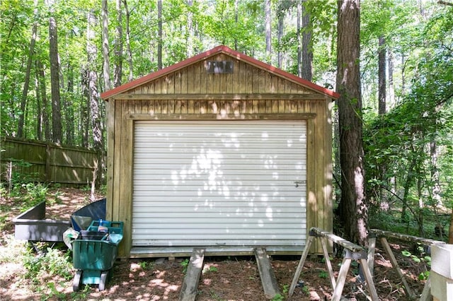garage featuring fence