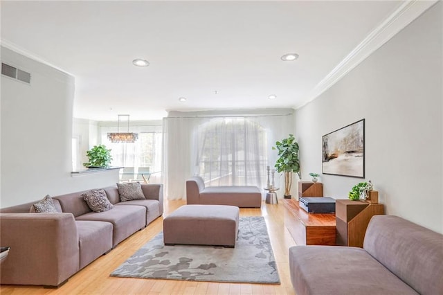 200 Renaissance Pkwy NE Unit 219, Atlanta, GA 30308 - living room with crown molding, wood finished floors, and recessed lighting