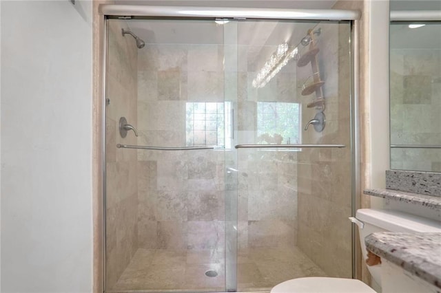200 Renaissance Pkwy NE Unit 219, Atlanta, GA 30308 - full bath featuring a shower stall and vanity