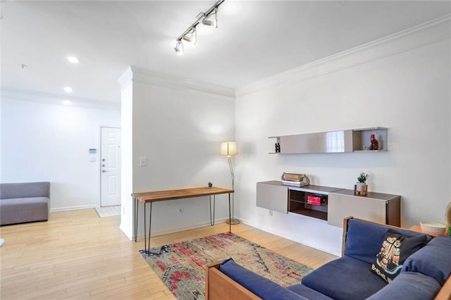 200 Renaissance Pkwy NE Unit 219, Atlanta, GA 30308 - living room with crown molding, wood finished floors, track lighting, and recessed lighting