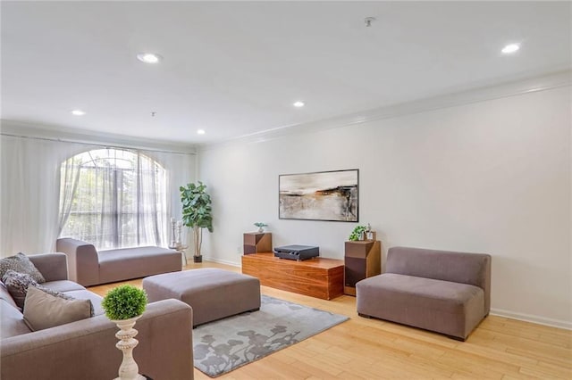 200 Renaissance Pkwy NE Unit 219, Atlanta, GA 30308 - living room featuring ornamental molding, wood finished floors, and recessed lighting