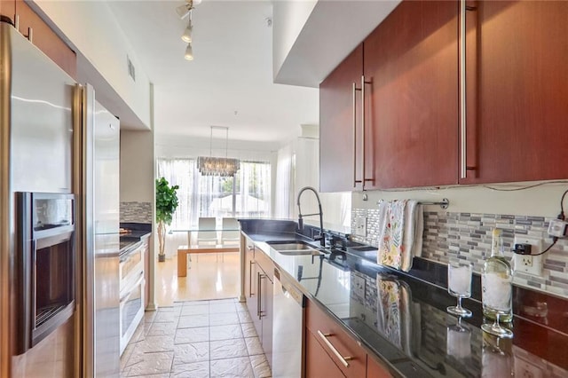 200 Renaissance Pkwy NE Unit 219, Atlanta, GA 30308 - kitchen featuring stainless steel refrigerator with ice dispenser, stone tile flooring, dishwasher, and backsplash