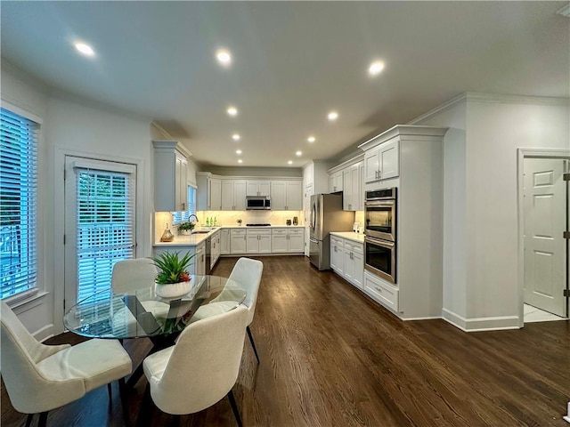 365 Morning Dew Cir, Roswell, GA 30075 - dining room featuring baseboards, recessed lighting, dark wood finished floors, and ornamental molding