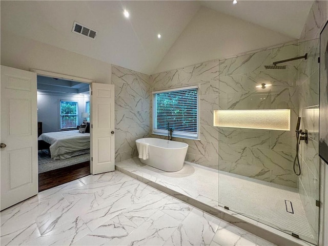 365 Morning Dew Cir, Roswell, GA 30075 - ensuite bathroom featuring marble tiled floors, a marble finish shower, a freestanding bath, recessed lighting, and lofted ceiling