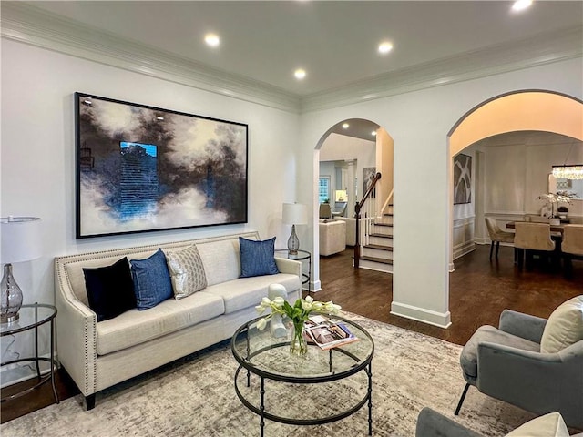 365 Morning Dew Cir, Roswell, GA 30075 - living area with arched walkways, wood finished floors, ornamental molding, stairs, and recessed lighting