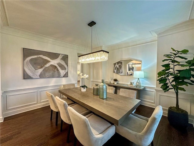 365 Morning Dew Cir, Roswell, GA 30075 - dining space with a chandelier, a decorative wall, dark wood-type flooring, crown molding, and a wainscoted wall