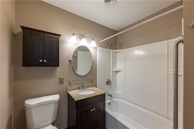 full bath featuring shower / bathtub combination, vanity, and toilet
