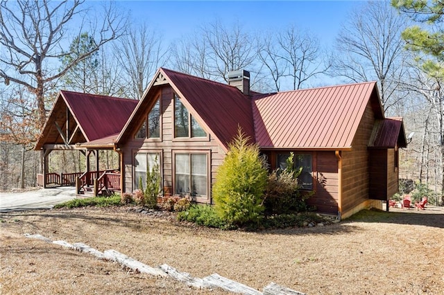 view of home's exterior with covered porch