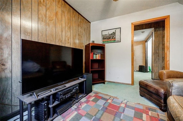 living room with crown molding and carpet flooring