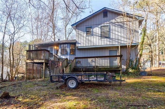 rear view of house with a deck