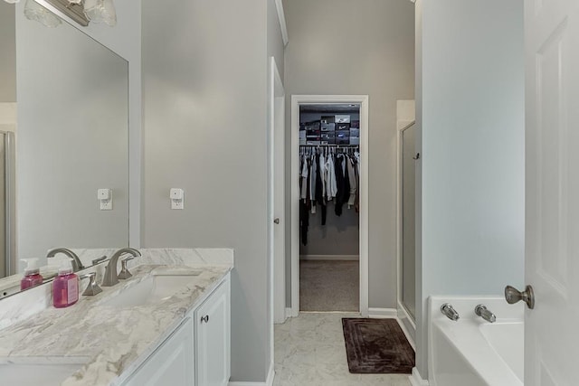 bathroom featuring vanity and plus walk in shower