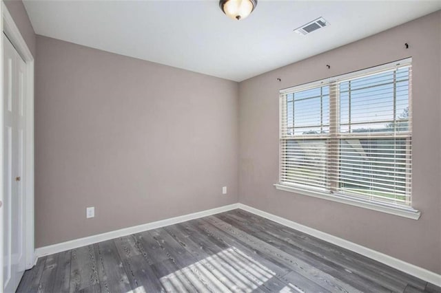 interior space with dark hardwood / wood-style floors