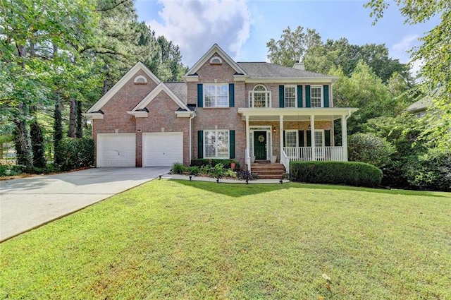 colonial home with a garage, a porch, and a front lawn