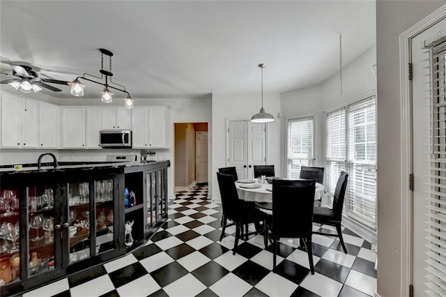 dining area featuring ceiling fan