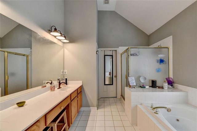 bathroom featuring lofted ceiling, separate shower and tub, tile patterned flooring, and vanity