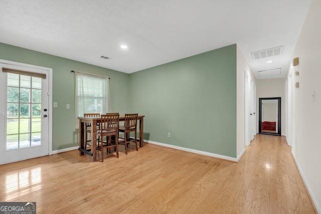 33 Russell Rd, Mcdonough, GA 30252 - dining area featuring attic access and light wood-style flooring