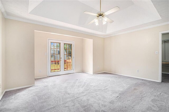 2928 Riverset Ct, Decatur, GA 30034 - unfurnished room featuring a raised ceiling, carpet floors, ceiling fan, and ornamental molding