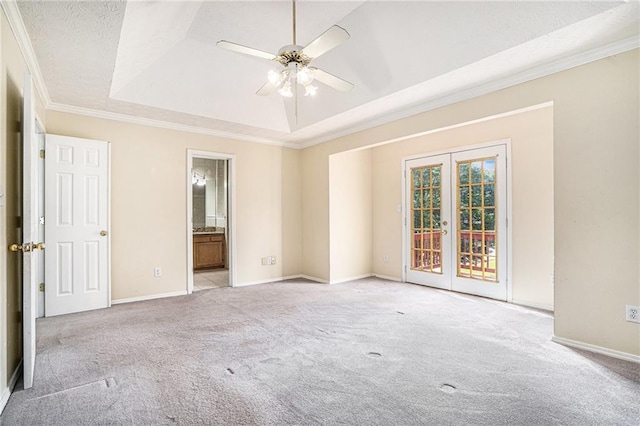 2928 Riverset Ct, Decatur, GA 30034 - unfurnished bedroom featuring french doors, carpet, access to exterior, crown molding, and a raised ceiling