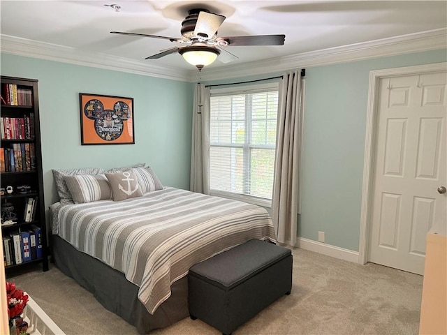 bedroom with light carpet, baseboards, ceiling fan, and ornamental molding