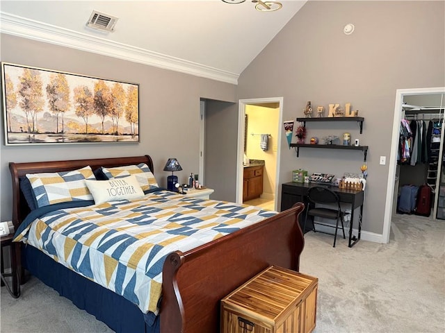bedroom featuring crown molding, light carpet, a spacious closet, baseboards, and visible vents