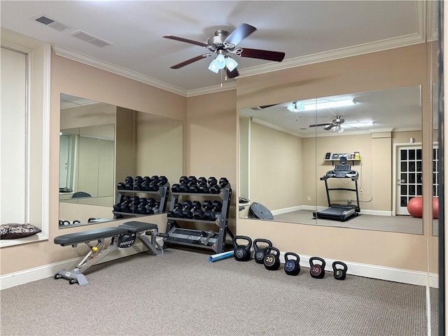 exercise area with ceiling fan and crown molding
