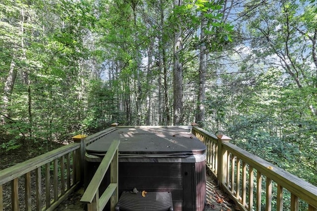 deck featuring a hot tub