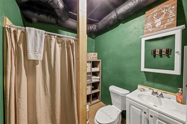 bathroom with walk in shower, toilet, brick wall, and vanity