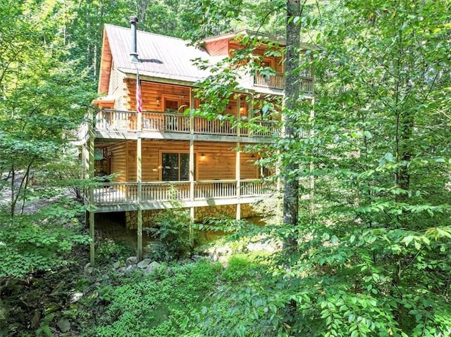 view of property exterior featuring a balcony