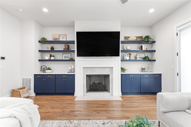 living room with light hardwood / wood-style floors