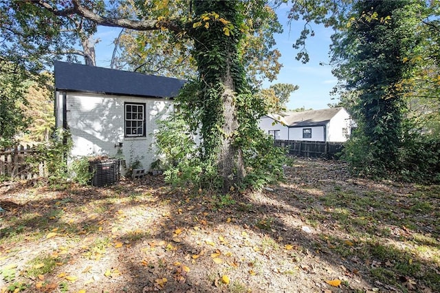 3060 Washington Rd, Atlanta, GA 30344 - view of side of property with brick siding and central AC unit