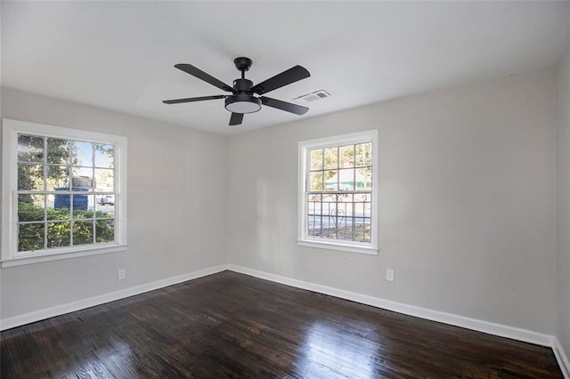 3060 Washington Rd, Atlanta, GA 30344 - empty room featuring dark wood-style floors, baseboards, and ceiling fan