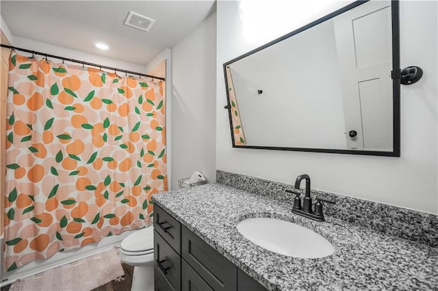 full bathroom featuring vanity, toilet, and shower / bath combo