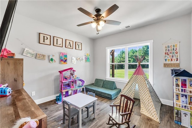 rec room featuring hardwood / wood-style floors and ceiling fan