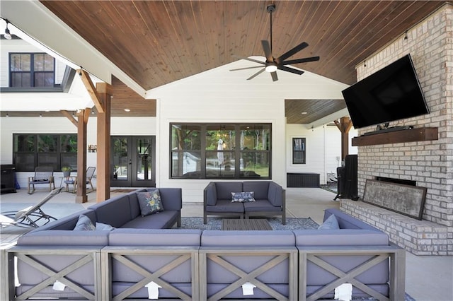 living room with wood ceiling, lofted ceiling, an outdoor brick fireplace, and french doors