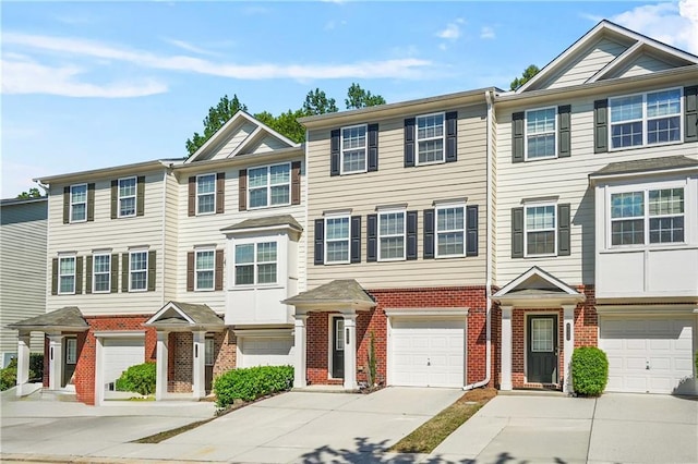 6887 Slate Stone Way SE Unit 3, Mableton, GA 30126 - multi unit property featuring driveway, brick siding, and a garage