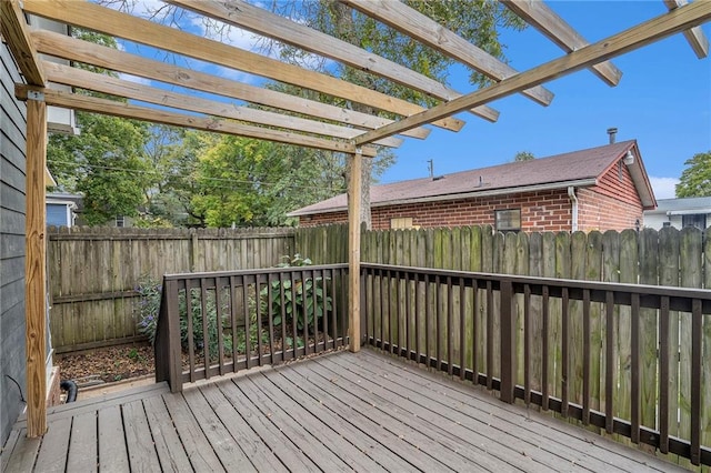 wooden terrace with a pergola