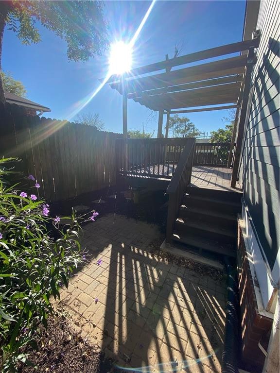 view of patio with a wooden deck