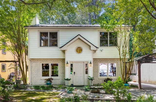 1071 Standard Dr NE, Brookhaven, GA 30319 - view of front facade with brick siding and a chimney